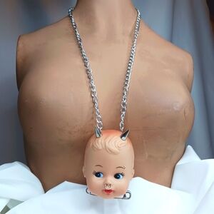 Vintage Doll Head with Devil Horns & Piercings Necklace.